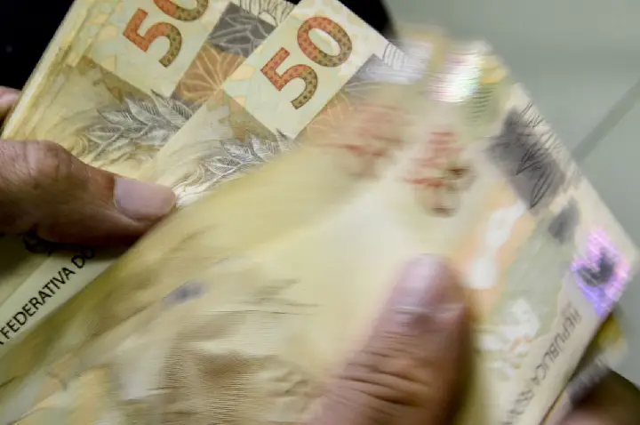 Caixa começa a pagar Bolsa Família de maio