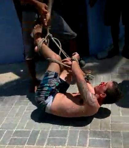 Após surtar, homem apanha, é amarrado e arrastado em praia de Natal; VEJA