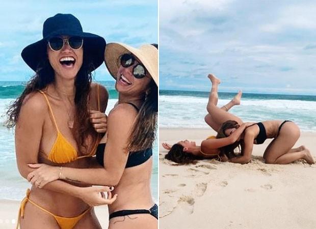 Débora Nascimento curte praia e faz várias fotos na areia com amiga atriz