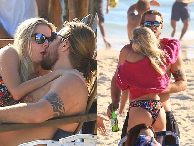 Ex-BBB Diego Alemão e namorada trocam beijos e carinhos em dia de praia